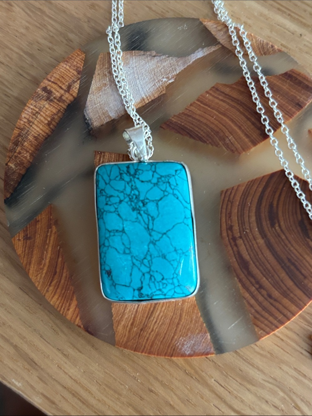 Artesian, handcrafted Sterling Silver  featuring a rectangular turquoise Pendant